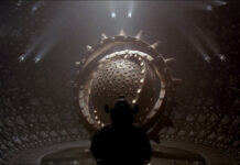 An astronaut standing in front of the machine in Event Horizon
