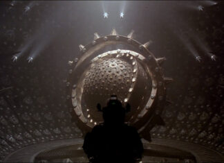 An astronaut standing in front of the machine in Event Horizon