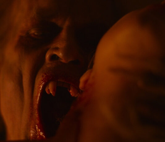 Anders Hove biting a victim as Radu in Subspecies V: Blood Rise