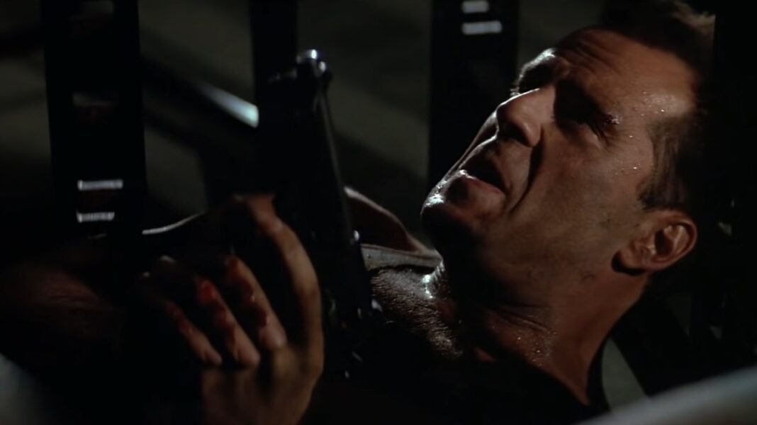 Die Hard - Bruce Willis as John McClane Under a Table
