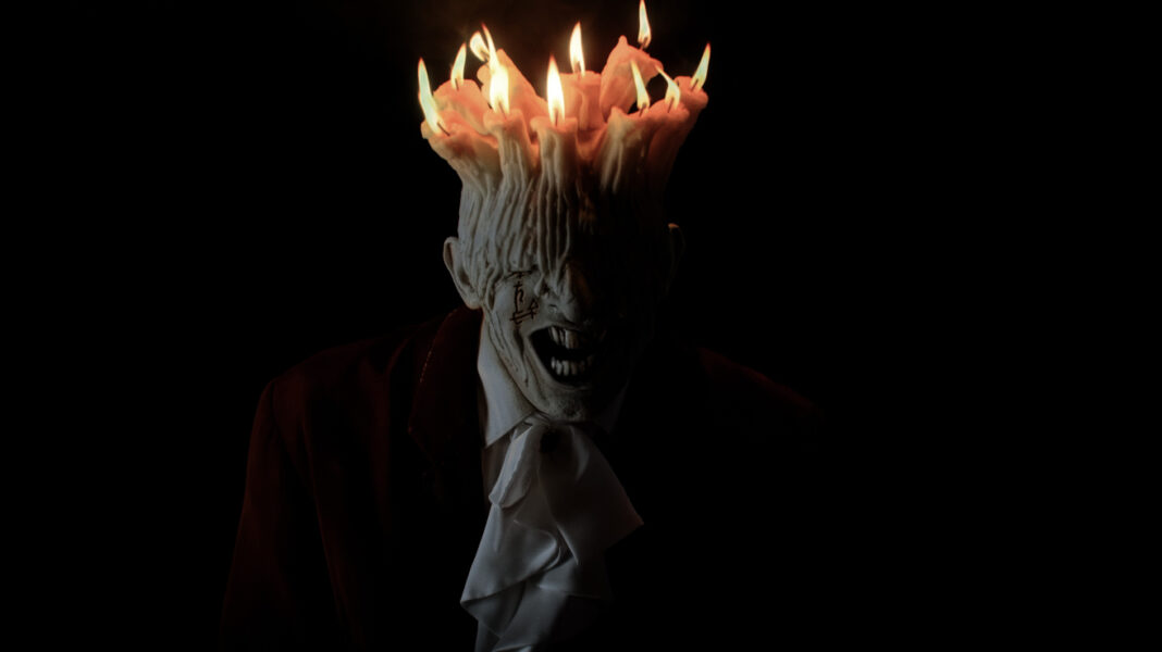 A monstrous man with no eyes and candles on his head in Tenebris Somnia