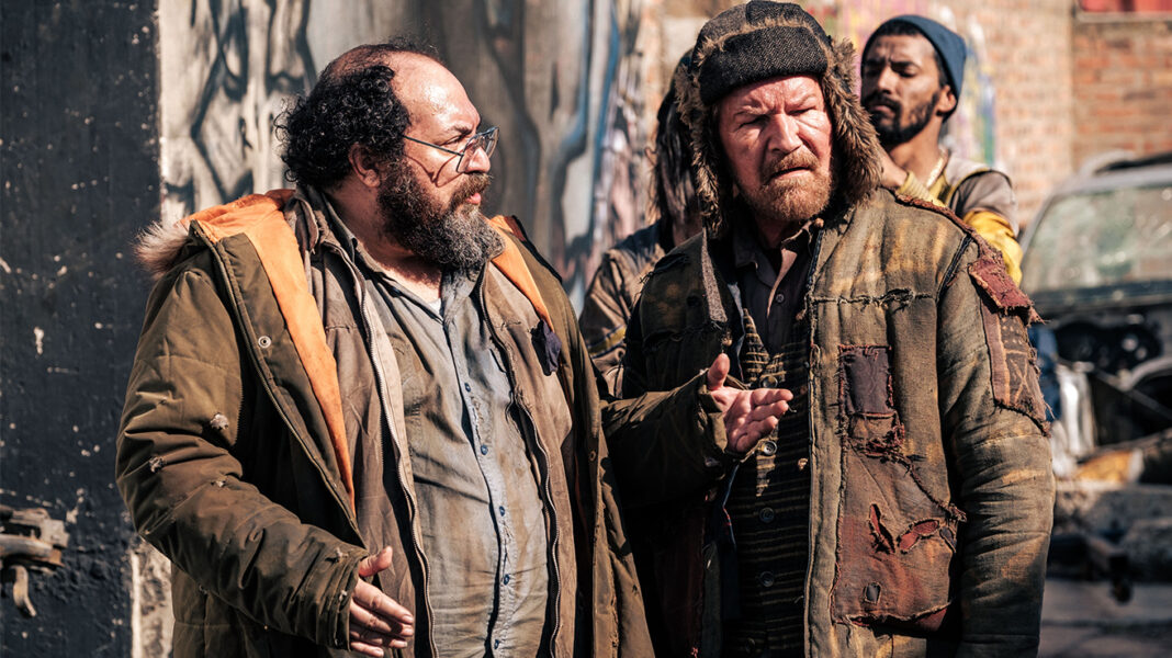 Joe Vaz as “Chef” and Sean Cameron Michael as “Ronald” in STREETTRASH (2024)