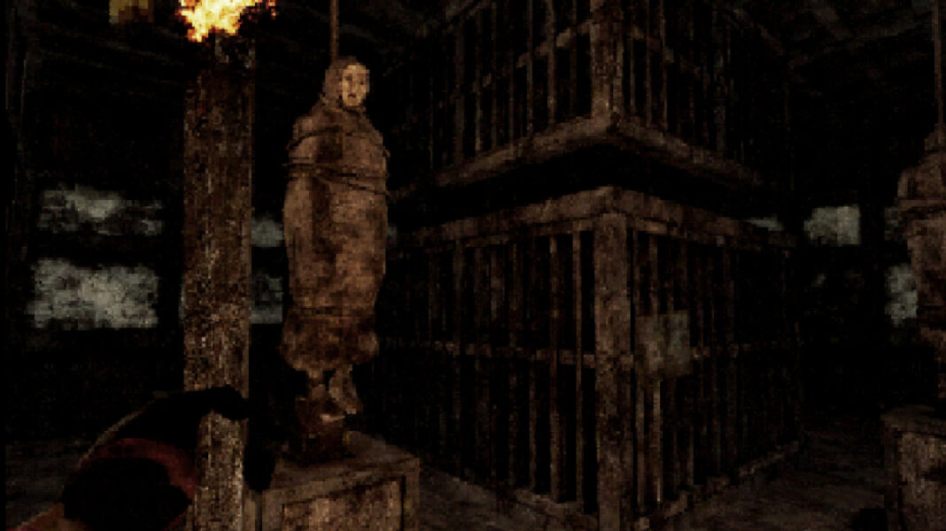 A hanged figure next to a dimly lit cage in Labyrinth of the Demon King