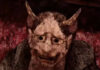 A mysterious man wearing an oni mask in Labyrinth of the Demon King