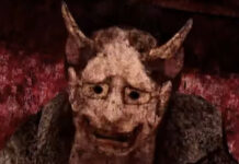 A mysterious man wearing an oni mask in Labyrinth of the Demon King