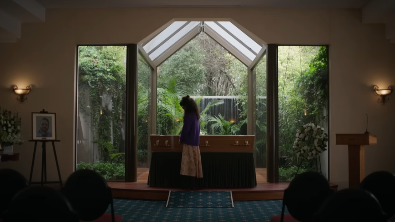 Sally Hawkins as Laura in front of a casket in Bring Her Back