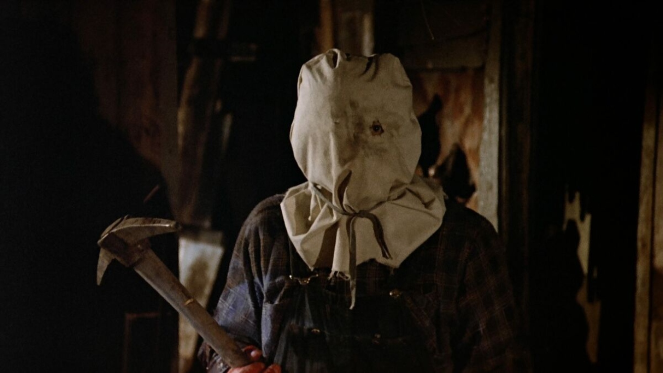 Jason Voorhees in a burlap sack mask in Friday the 13th Part 2