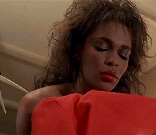 A woman is about to get killed with scissors