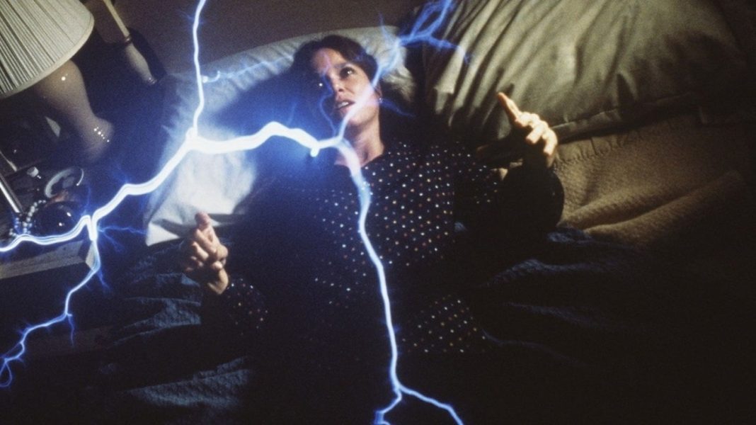 A woman being shocked by electricity from a ghost in The Entity (1982)