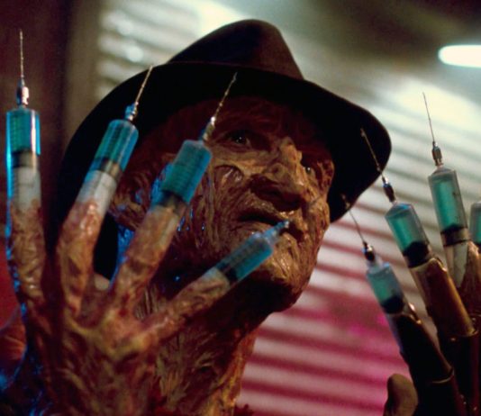 Robert Englund as Freddy Kreuger with syringe hands in A Nightmare on Elm Street 3: Dream Warriors