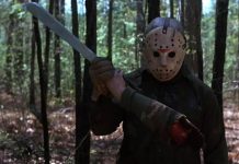 Jason Voorhees holding a severed arm in Friday the 13th Part VI: Jason Lives