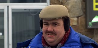 Del and Neal get into a pick-up truck for a ride