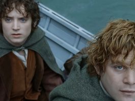 Frodo and Samwise in a boat in The Lord of the Rings: The Fellowship of the Ring