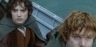 Frodo and Samwise in a boat in The Lord of the Rings: The Fellowship of the Ring