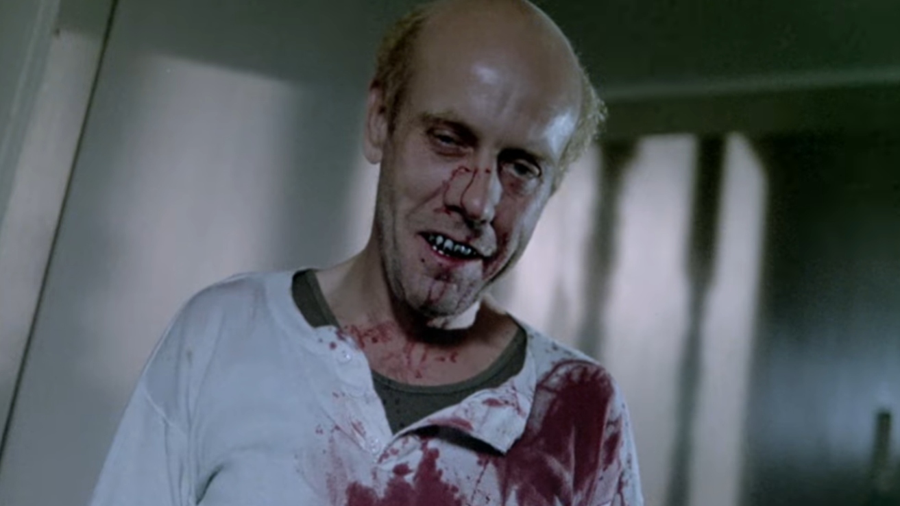 Edward Terry as The Freak in Luther the Geek