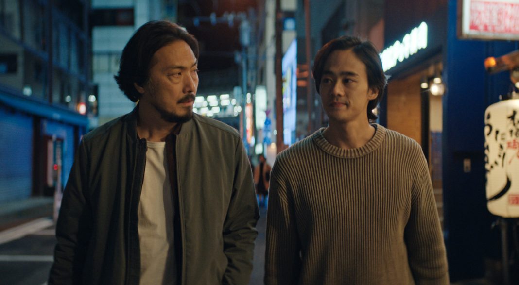 Takehiro Hira and Ren Watabe walk down a street in in Monarch Legacy of Monsters Season 2, Ep. 3 'Secrets'