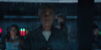 An older Lee Shaw (Kurt Russell) looks out of a rain-soaked window in Monarch Legacy of Monsters Season 2, Episode 9 'Ends of the Earth'