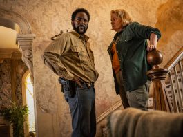 Boyd and Donna Raines talk while they stand at a staircase in FROM Season 4 Episode 1