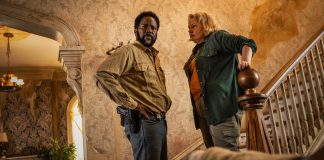 Boyd and Donna Raines talk while they stand at a staircase in FROM Season 4 Episode 1