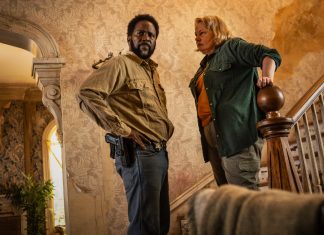Boyd and Donna Raines talk while they stand at a staircase in FROM Season 4 Episode 1