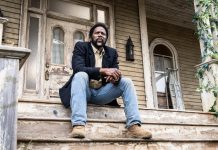 Boyd (Harold Perrineau) sits on a front porch in FROM Season 4 Episode 4