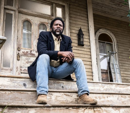 Boyd (Harold Perrineau) sits on a front porch in FROM Season 4 Episode 4