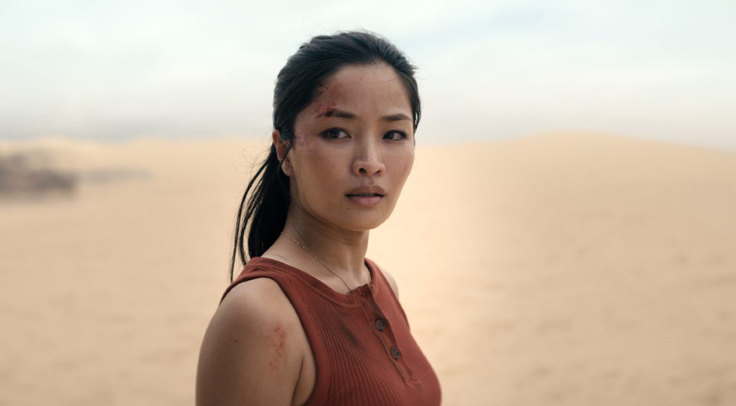 Cate Randa looks at something in Monarch Legacy of Monsters Season 2, Episode 8 'Separate Ways'