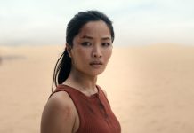 Cate Randa looks at something in Monarch Legacy of Monsters Season 2, Episode 8 'Separate Ways'