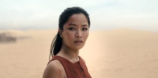 Cate Randa looks at something in Monarch Legacy of Monsters Season 2, Episode 8 'Separate Ways'