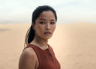 Cate Randa looks at something in Monarch Legacy of Monsters Season 2, Episode 8 'Separate Ways'