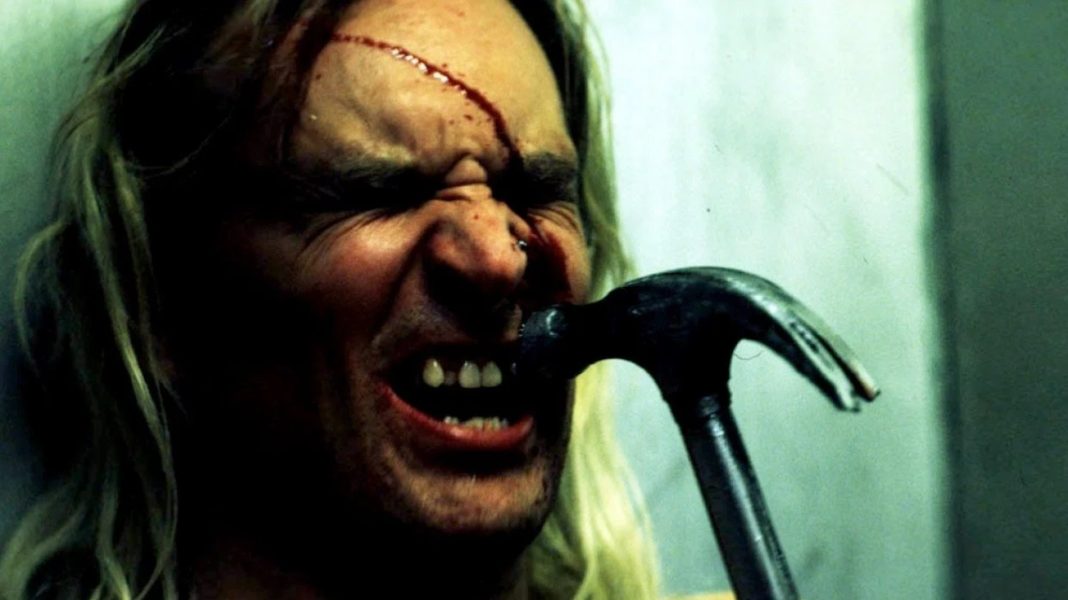 Man getting struck with hammer in Cradle of Fear (2001)