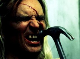 Man getting struck with hammer in Cradle of Fear (2001)