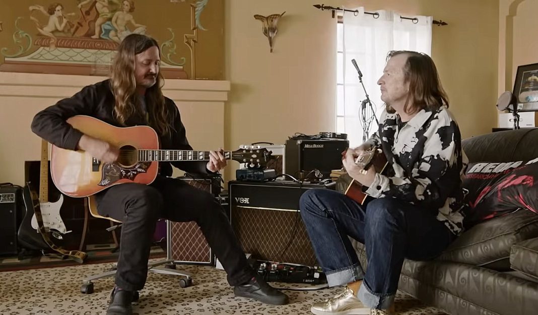 Redd Kross playing guitars in a living room in BORN INNOCENT THE REDD KROSS STORY