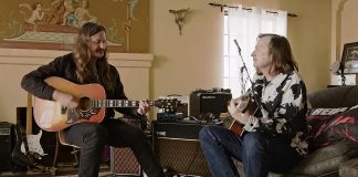 Redd Kross playing guitars in a living room in BORN INNOCENT THE REDD KROSS STORY