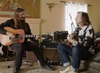 Redd Kross playing guitars in a living room in BORN INNOCENT THE REDD KROSS STORY