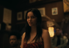 A woman talks to her boyfriend and friends in a bar in Obsession