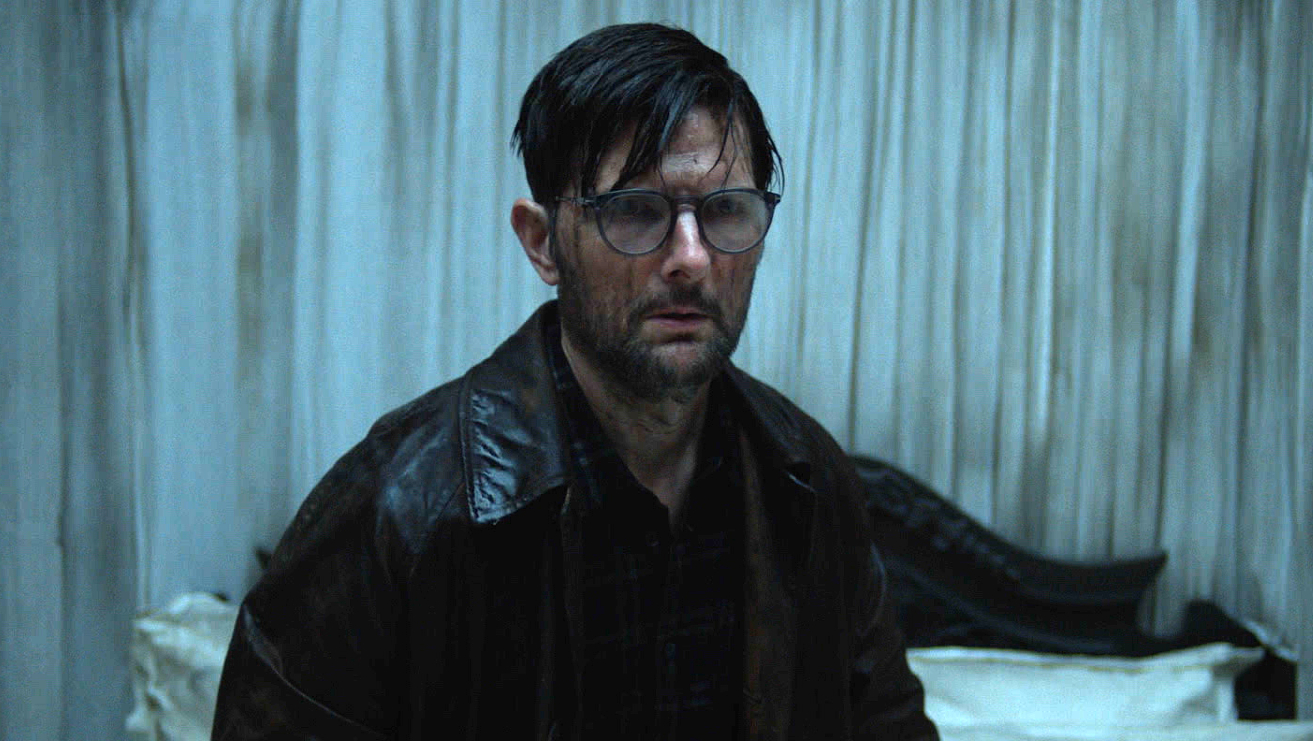 horrorgeeklife.com - Jeff Fountain - 'Hokum' Review: Adam Scott Leads a Chilling Descent Into Madness