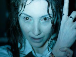 Fiona (Florence Ordesh) points up in Hokum