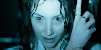 Fiona (Florence Ordesh) points up in Hokum