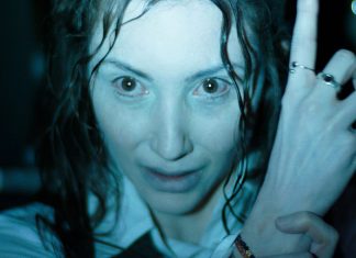 Fiona (Florence Ordesh) points up in Hokum