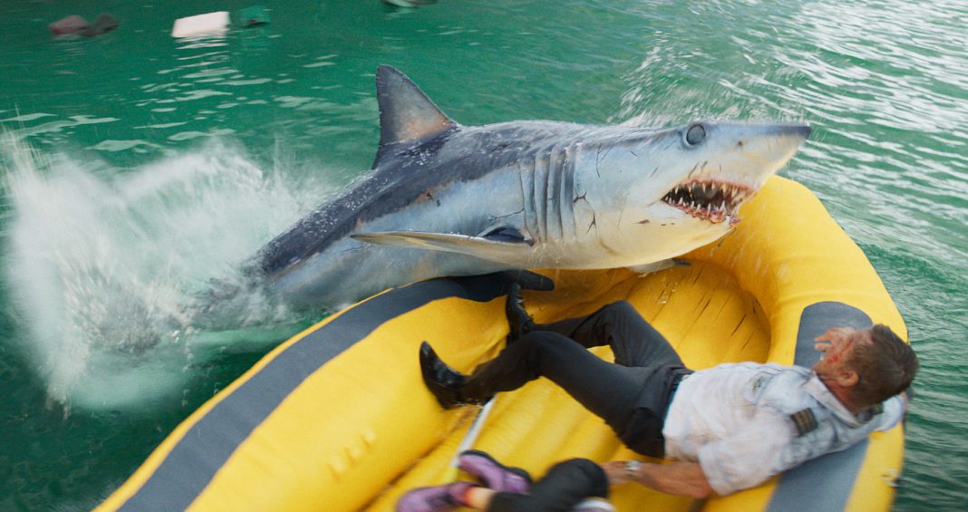 In a life raft, Aaron Eckhart's character fights off a shark in Deep Water In a life raft, Aaron Eckhart's character fights off a shark in Deep Water