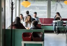 Tabitha (Catalina Sandino Moreno) sits at a diner in FROM Season 4, Episode 3