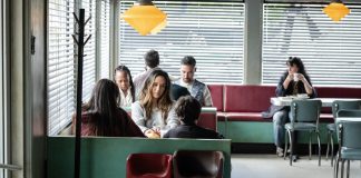 Tabitha (Catalina Sandino Moreno) sits at a diner in FROM Season 4, Episode 3