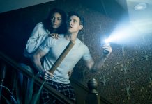 A husband and wife come down the stairs in fear in the Paranormal Activity Stage Play