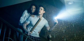‘Paranormal Activity’ Stage Play Review: A Terrifying Live Experience for Horror Fans A husband and wife come down the stairs in fear in the Paranormal Activity Stage Play