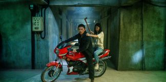 A man and his daughter sit on a motorcycle in The Furious