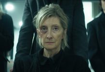 Shudder’s ‘The Voices of Our Mother’ Review: A Dysfunctional Family Faces Its Demons A woman gets pushed in a wheelchair to a funeral in The Voices of Our Mother