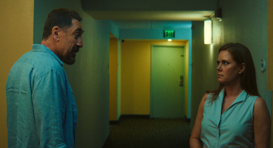 Anna and Max look at each other in a hallway in Apple TV's Cape Fear