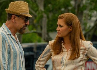 Anna stands with her hands on her hips while talking to Max Cady in Cape Fear Episode 4