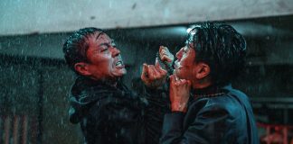 Two men fight in the rain in The Furious
